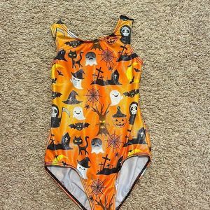Child size 4 leotard no tears rips or piling. Only worn a few times .